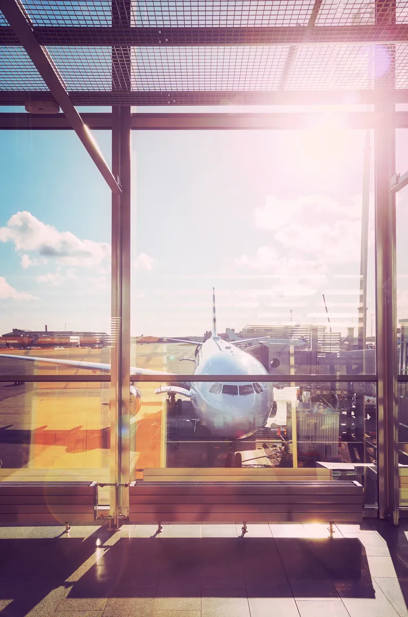 Airplane seen from the windows of a terminal