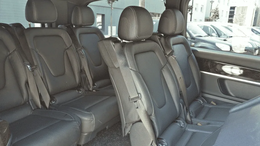 Grey seats and interior space of a van