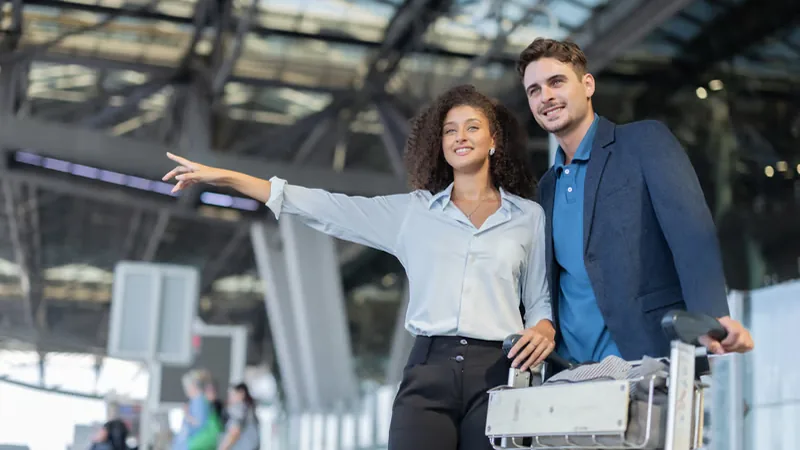 Traveler signaling for a taxi at the airport